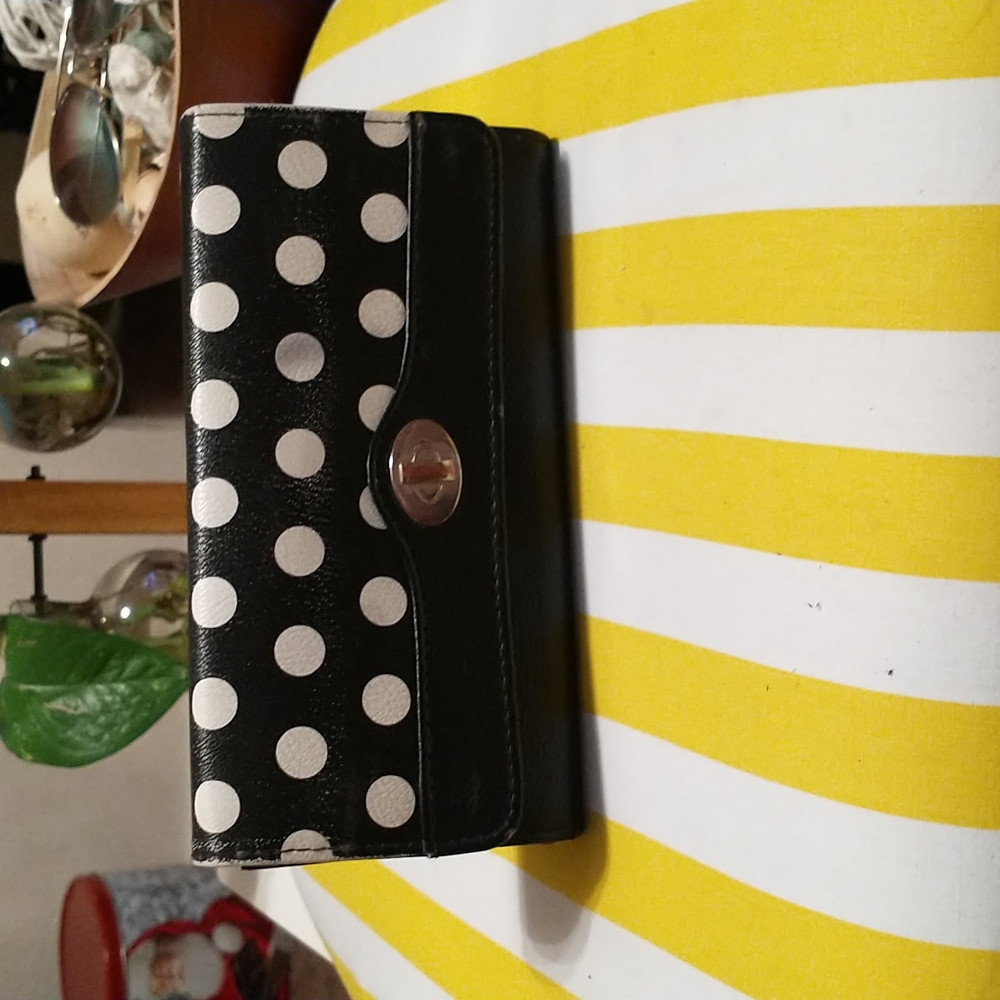 Black and white polka dot wallet with pink lining